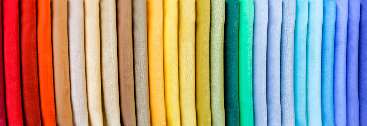 Pile of rainbow folded clothes